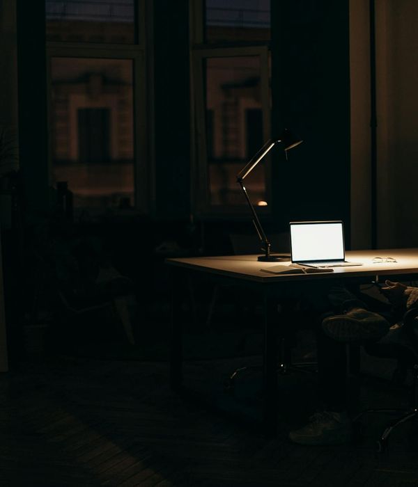 young professional man working with laptop
